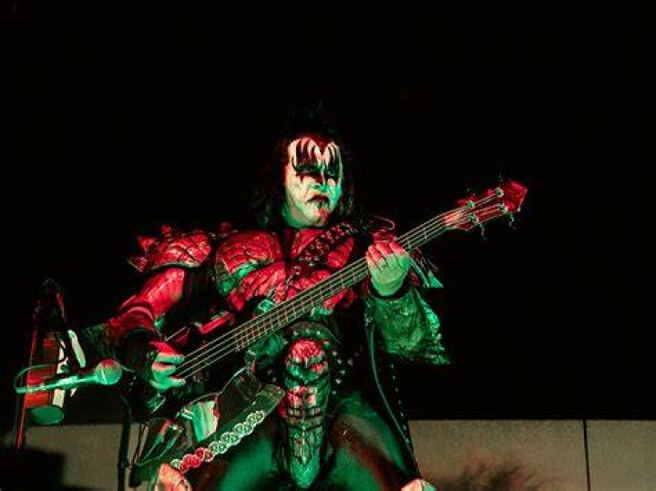 What degree does Gene Simmons have? What instrument did Gene Simmons play?